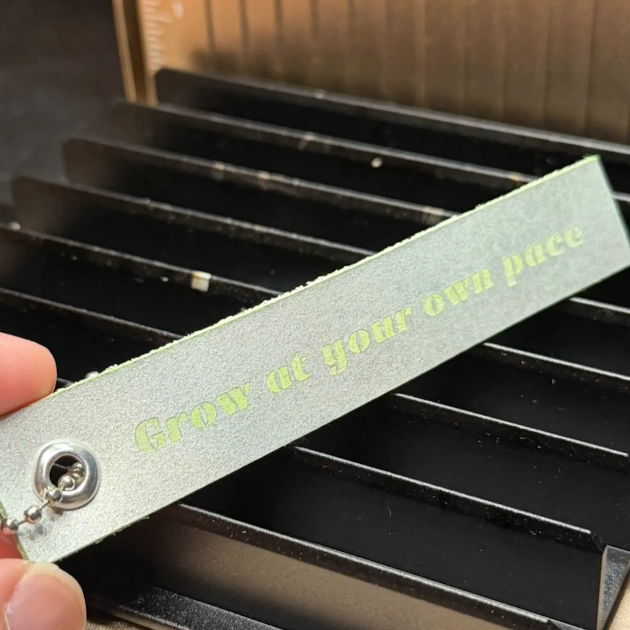 Light Teal to Black Laserable PU Leather test grid