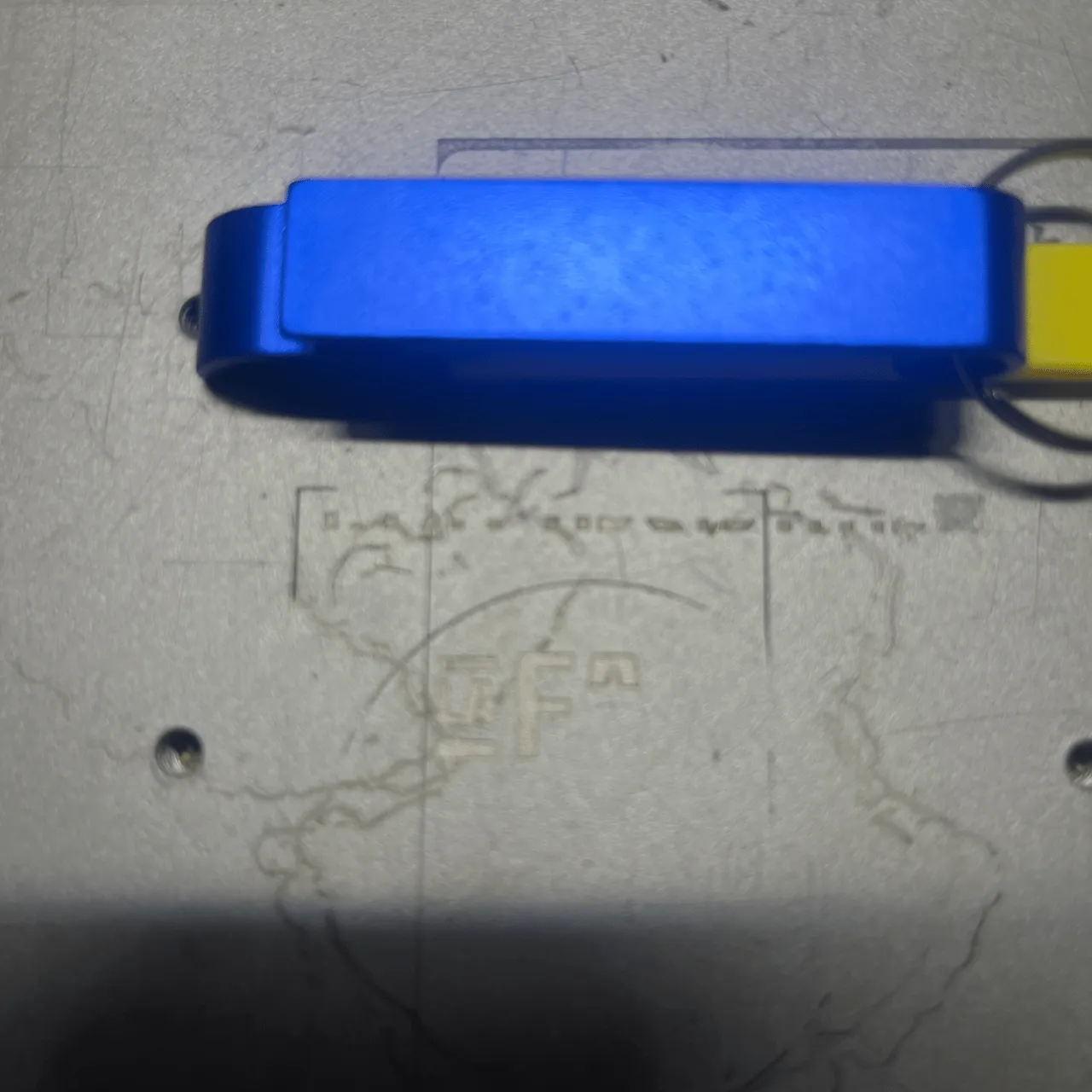 Deep Blue Anodized Aluminum Bone Dog Tag test grid