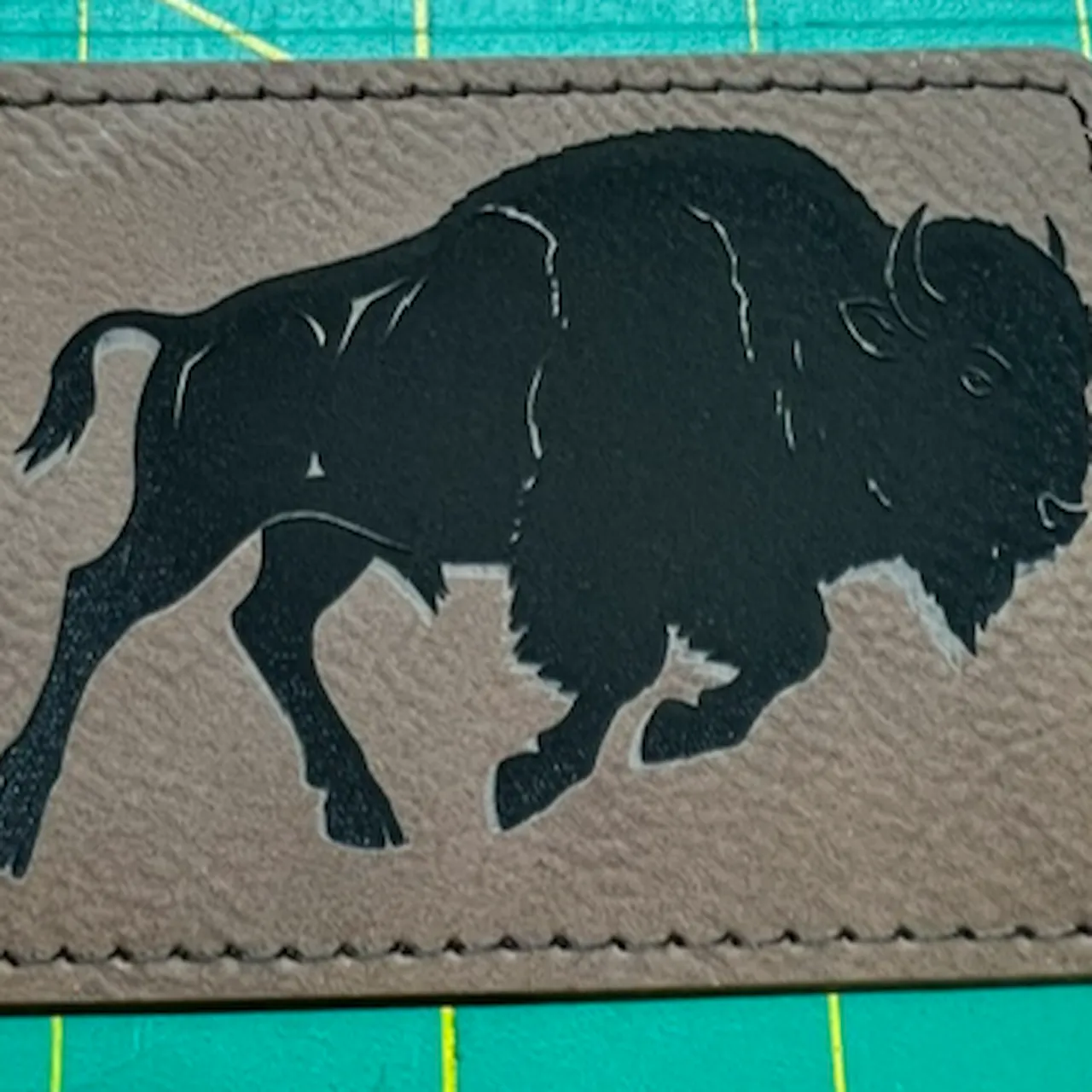 Vintage Brown to Black Laserable PU Leather test grid
