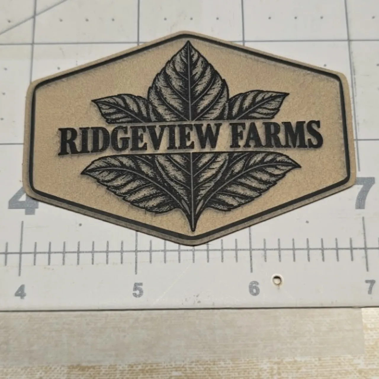Brown to Black Laserable PU Leather test grid
