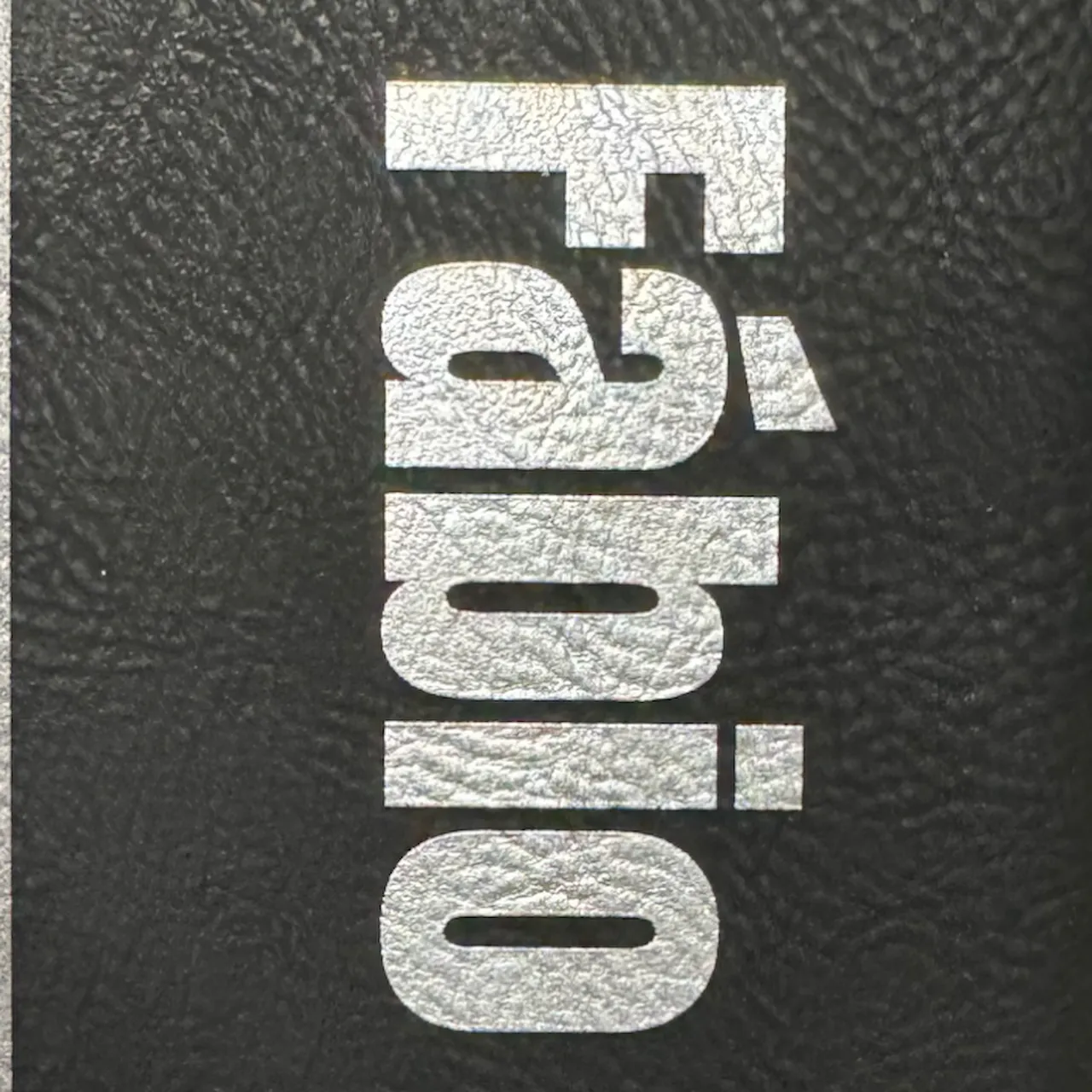 Black to Silver Laserable PU Leather test grid