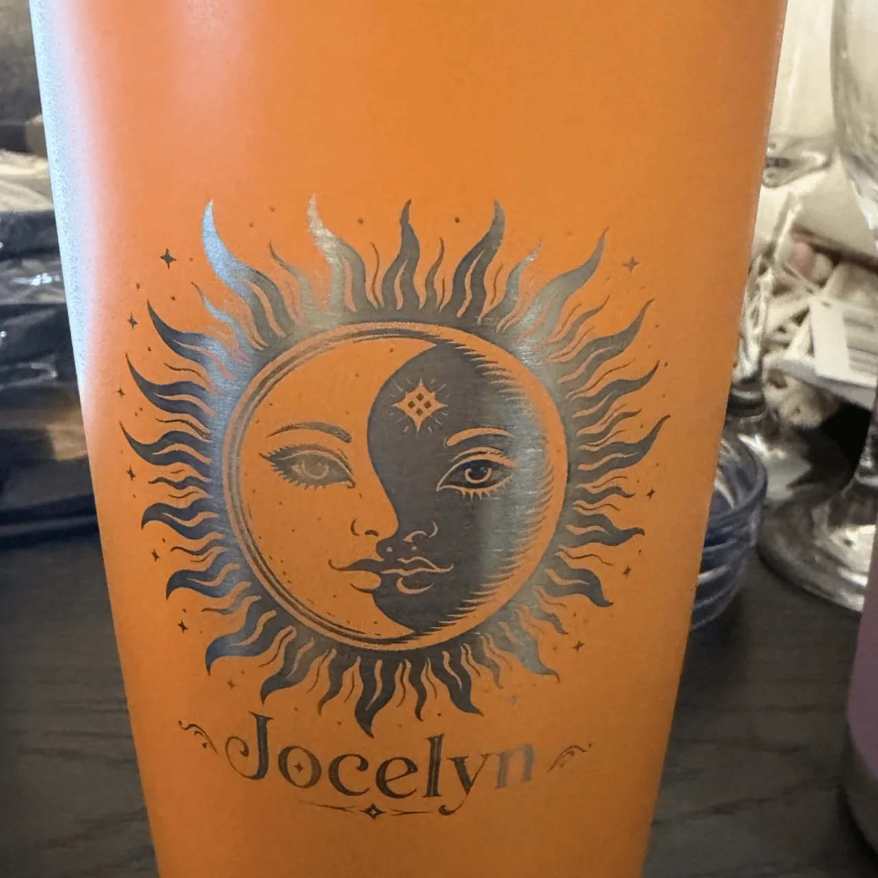 Orange powder coated tumbler test grid