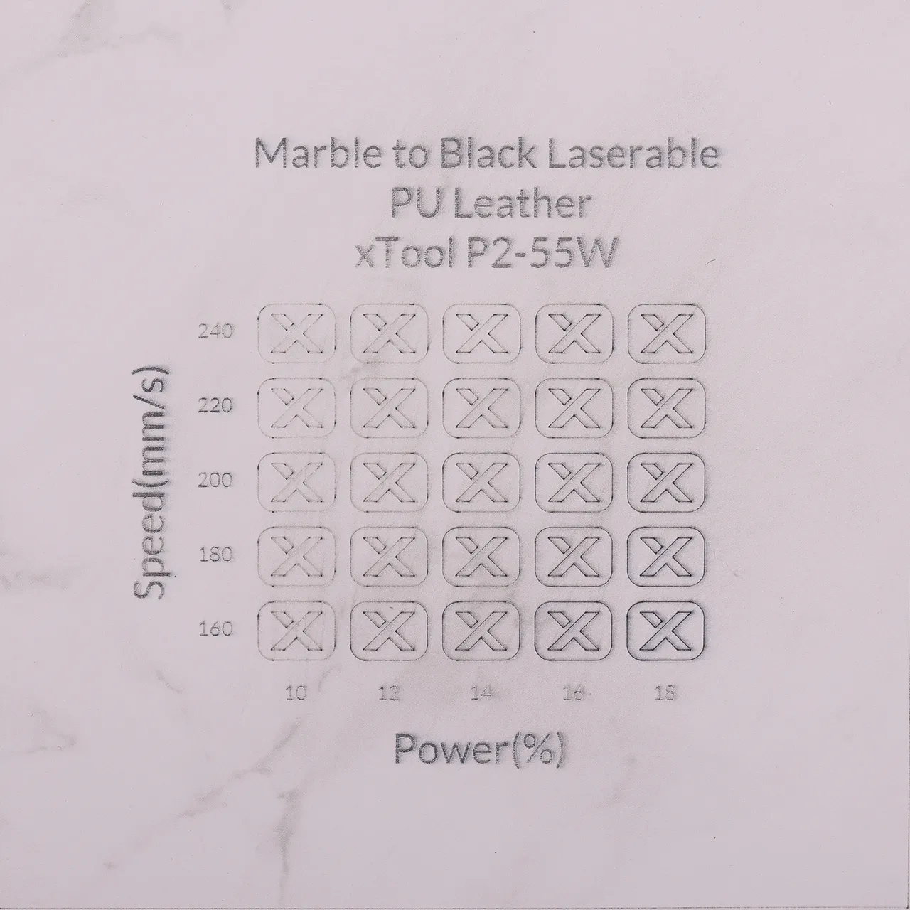 Marble to Black Laserable PU Leather test grid